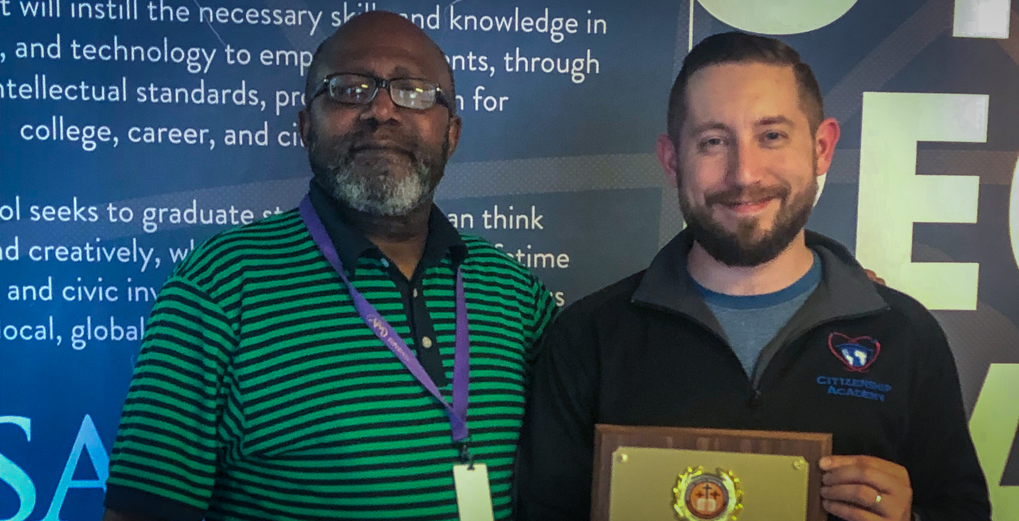 SASCCS Dean of Students, Mr. Frisina received Anointed Vision Ministry COGIC's Community Service Award, presented by Pastor Earl Evans