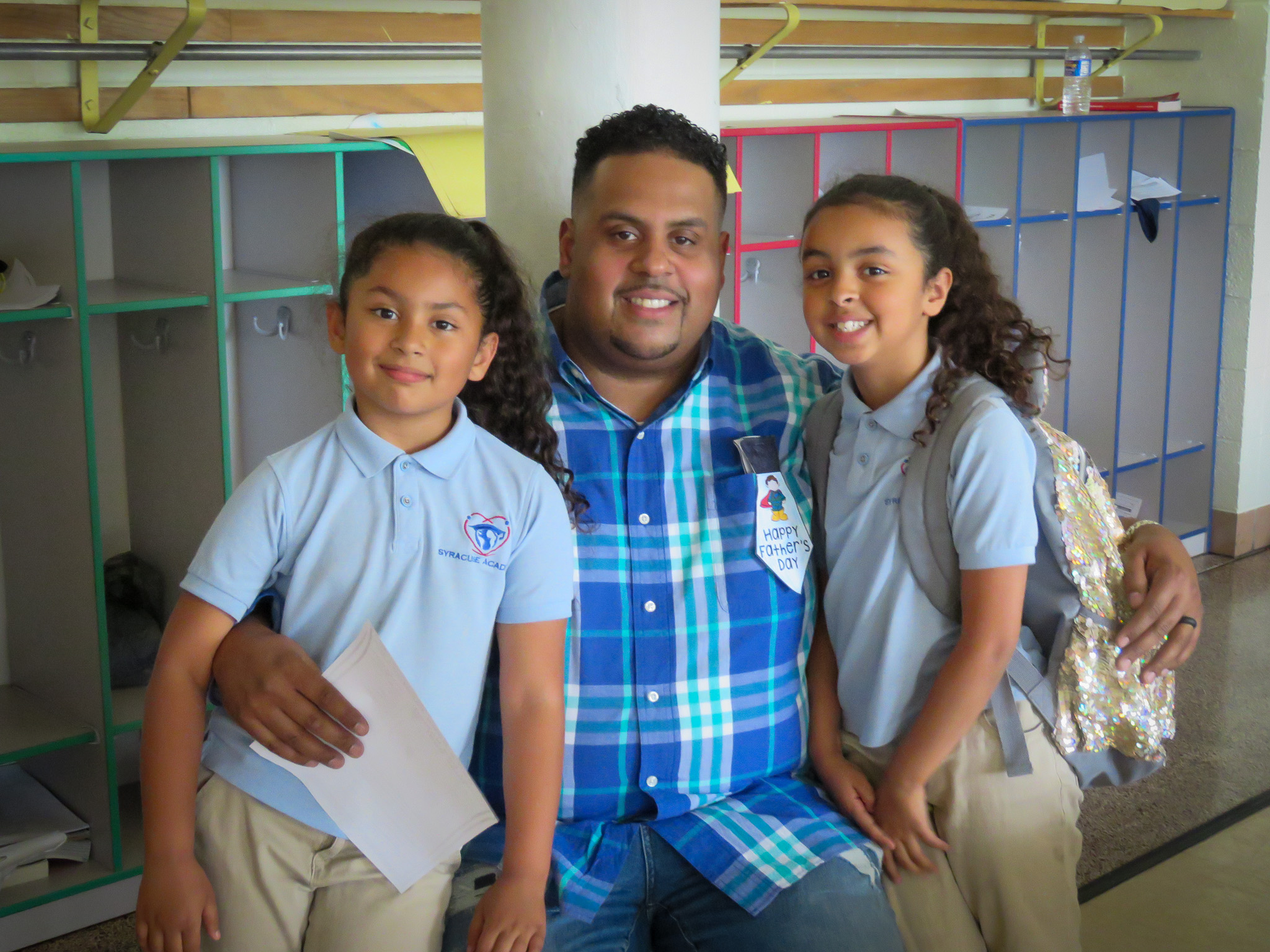 Atoms share donuts with dads and other male role models in their lives at our Donuts for Dads event