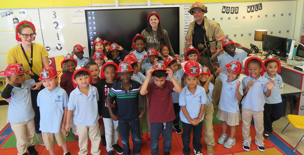 Fireman Dan Connors of the Syracuse City Fire Department joined the Kindergarten Atoms for story time