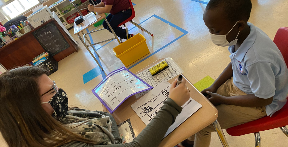 Second grade Atoms at Syracuse Academy of Science and Citizenship school persevere and solve their math equations using a variety of problem solving techniques.