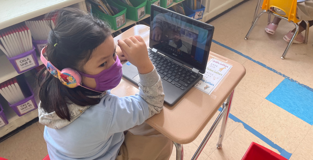 Syracuse Academy of Science and Citizenship Atom listens to virtual guest speakers for its 28 Speakers in 28 Days event.