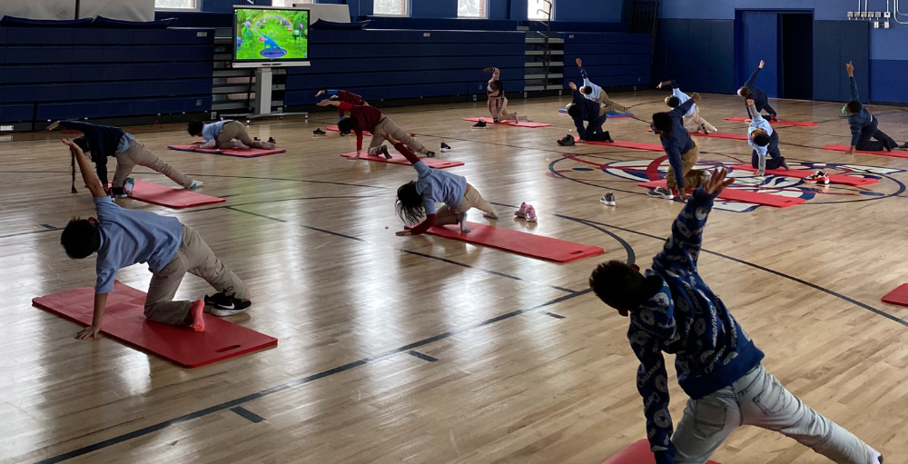 Syracuse Academy of Science and Citizenship elementary school Atoms started a new Gym Class unit, Yoga, where the students will practice their flexibility, coordination and connecting their minds and bodies. 