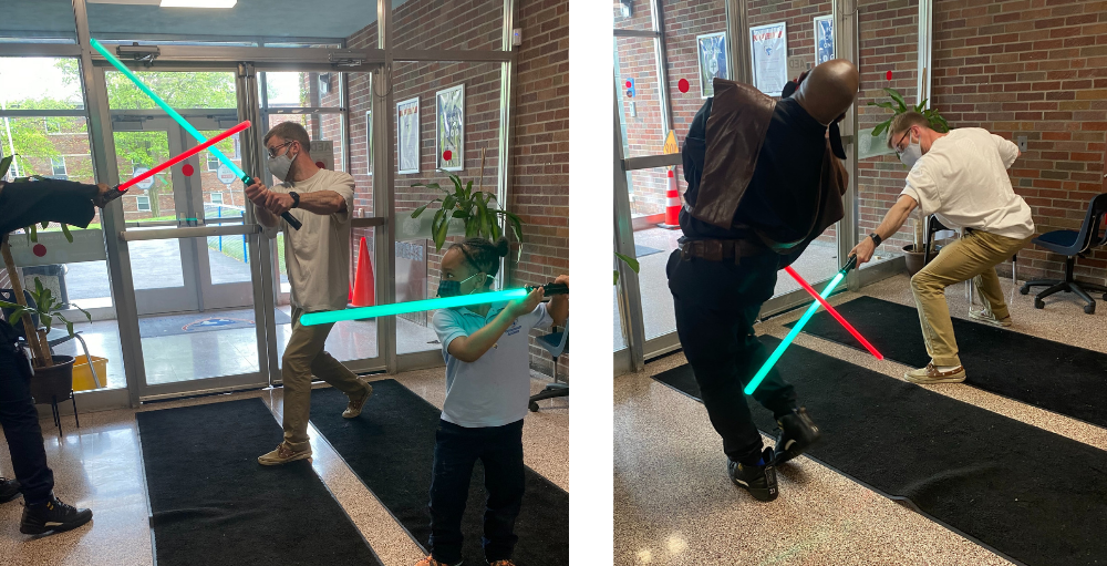 May the Fourth it was, celebrate the Atoms did. Mr. Cognetti and a young Jedi Master in Training helped defend Syracuse Academy of Science and Citizenship from Jedi Master McGriff.