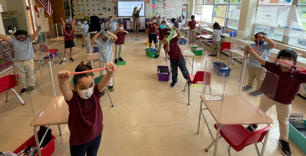 Syracuse Academy of Science and Citizenship 2nd grade Atoms created their own slime using glue, baking soda and a little saline solution.