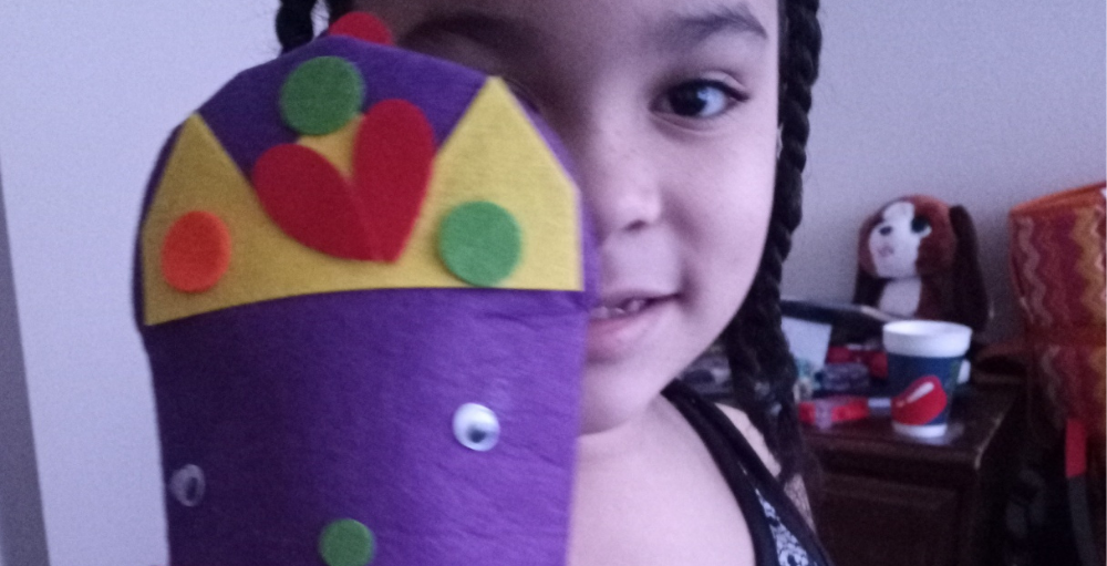 Syracuse Academy of Science and Citizenship Atom used their character strength of creativity when making a hand puppet for a class project.