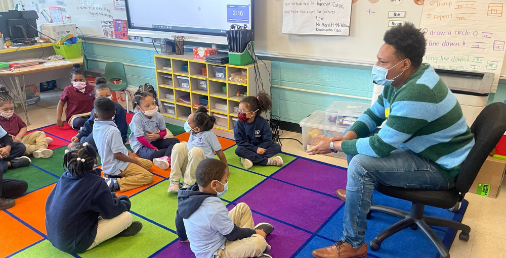 Syracuse Fire Department fireman Bernard Bullock spoke with the Syracuse Academy of Science and Citizenship elementary school students for its 28 Speakers in 28 Days series, about fire safety and the importance of being goal-oriented.