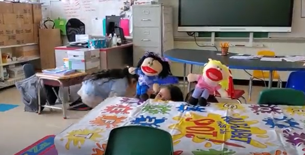 Syracuse Academy of Science and Citizenship elementary school’s 1st-grade ENL students put on a puppet show performance of Goldilocks and the Three Bears.