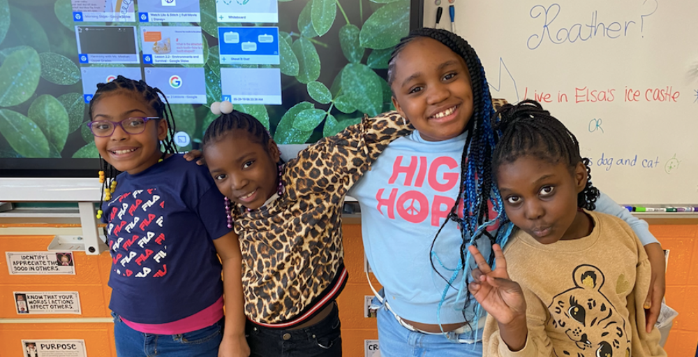 Syracuse Academy of Science and Citizenship elementary school students in 3B receive a ‘Dress to Impress’ day after reaching their RACECAR Writing goal of 300 points. 
