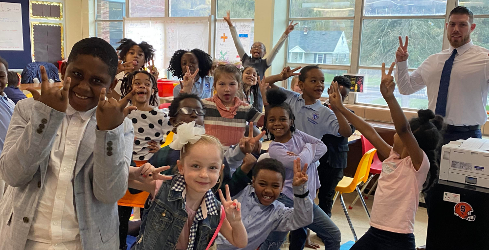 Syracuse Academy of Science and Citizenship elementary school students participate in professional dress day as their Spirit Day theme during Kindness week.