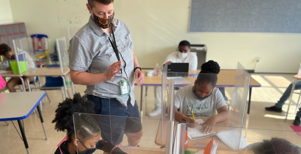 Syracuse Academy of Science and Citizenship elementary school students practice their math and reading comprehension skills during the summer months.
