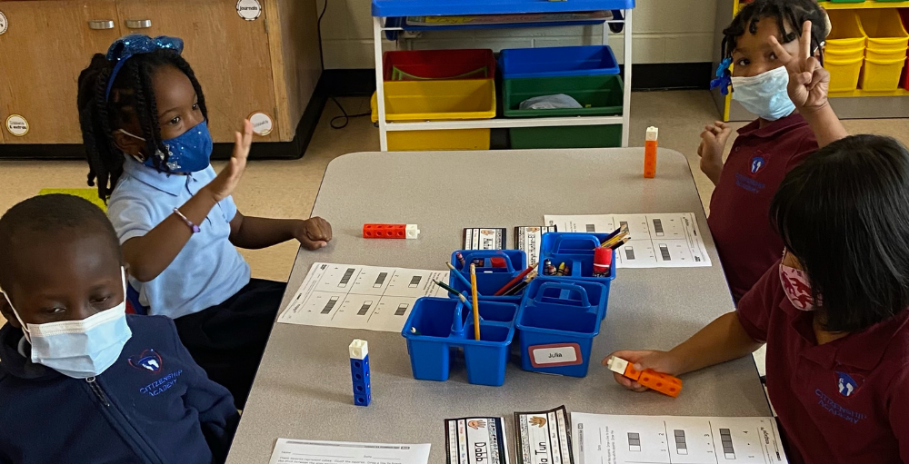 Syracuse Academy of Science and Citizenship elementary school's Deans, and Academic Coaches do a daily classroom walkthrough to check-in with the teachers and the students.