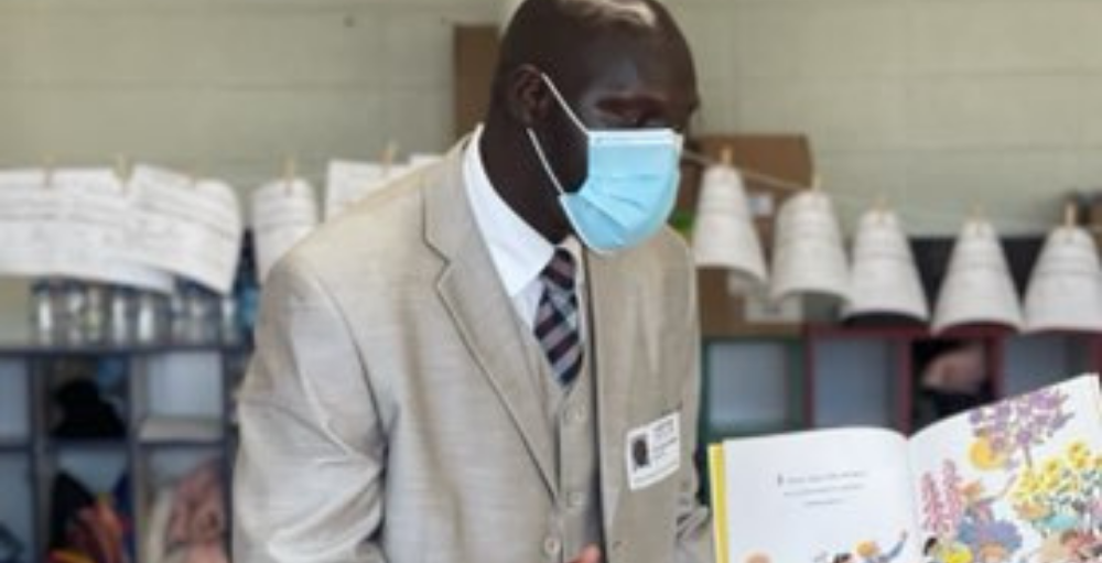 Syracuse Academy of Science and Citizenship elementary school welcomed guest speaker and reader, Honorable Chol Majok of the Common Council District 3.