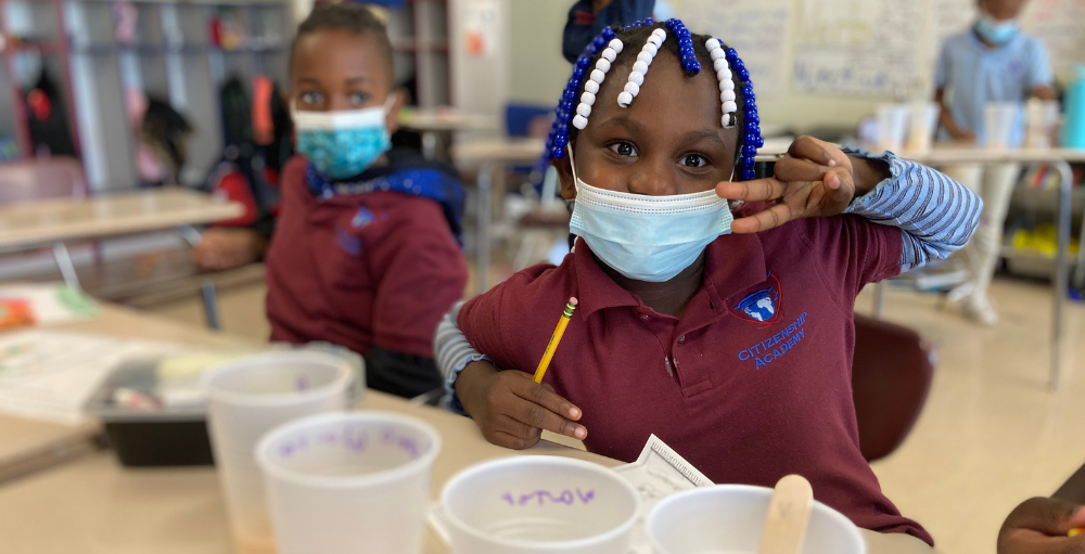 Syracuse Academy of Science and Citizenship 3rd grade students study the Scientific Method by conducting a Halloween themed science experiment using candy corn.