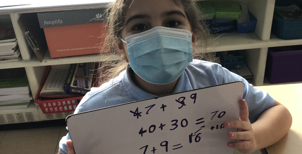 Syracuse Academy of Science and Citizenship 2nd grade students share their favorite way to add two-digit numbers.