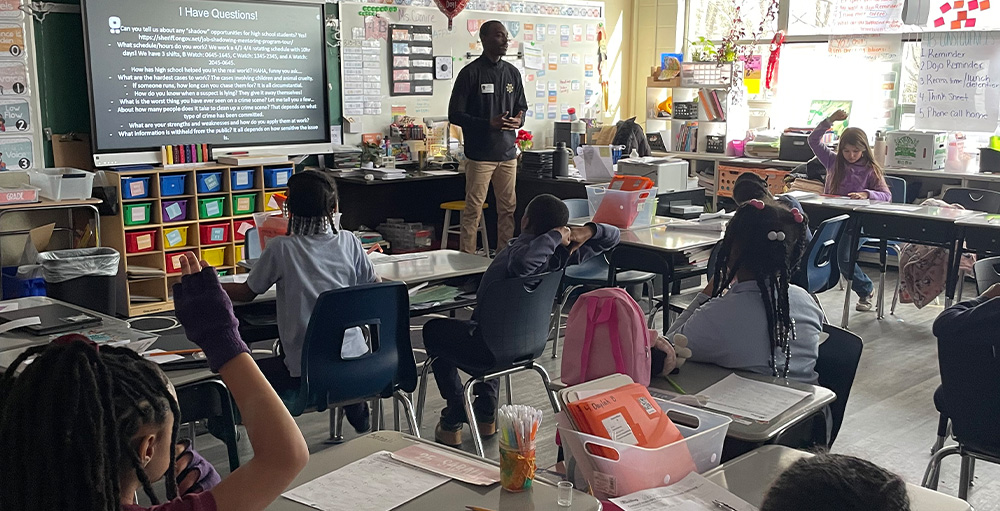 Exploring Law Enforcement: Deputy Sheriff James Dixon Visits Citizenship & Science Academy of Syracuse Elementary School